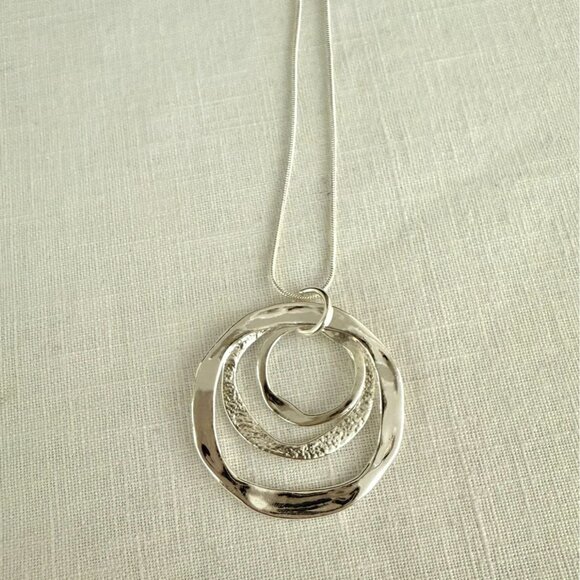 Silvertone Necklace 22-24 inches with Pendant Trio of Irregular Textured Rings - Picture 3 of 6